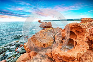 Awesome  view of Red Rocks called Ã¢â¬Åis Scoglius ArrubiusÃ¢â¬Â on Cea beach photo